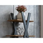 Poličnik LIAM . Poličnik LIAM je narejen iz kvalitetne laminirane plošče v barvi hrasta s črno barvo. Material: - Laminirana plošča Barve: - Hrast /