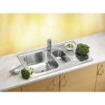 Pomivalno korito E110 . Inox pomivalno korito E110 je vgradno. Korito ima dve posodi, eno večjo in eno manjšo, ter odlagalno površino. Postavitev korita je