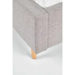 Postelja DORI 160 . Oblazinjena postelja DORI 160 je elegantna, sodobna in kvalitetna. Ogrodje in naslonjalo sta izdelana iz kvalitetne tkanine v sivi barvi,