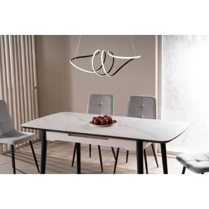 Raztegljiva jedilna miza LAROS Raztegljiva jedilna miza LAROS . Raztegljiva jedilna miza LAROS je modernega dizajna. Mizna plošča je narejena iz kvalitetne MDF plošče, ter keramike v