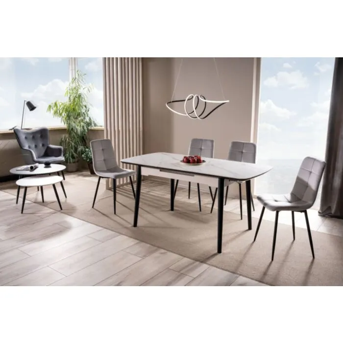 Raztegljiva jedilna miza LAROS Raztegljiva jedilna miza LAROS . Raztegljiva jedilna miza LAROS je modernega dizajna. Mizna plošča je narejena iz kvalitetne MDF plošče, ter keramike v