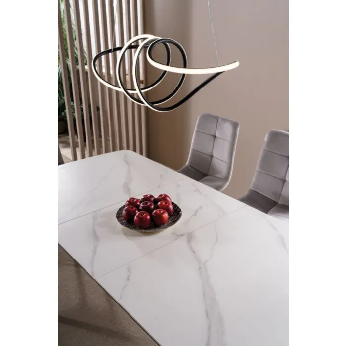 Raztegljiva jedilna miza LAROS Raztegljiva jedilna miza LAROS . Raztegljiva jedilna miza LAROS je modernega dizajna. Mizna plošča je narejena iz kvalitetne MDF plošče, ter keramike v