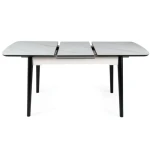 Raztegljiva jedilna miza LAROS . Raztegljiva jedilna miza LAROS je modernega dizajna. Mizna plošča je narejena iz kvalitetne MDF plošče, ter keramike v