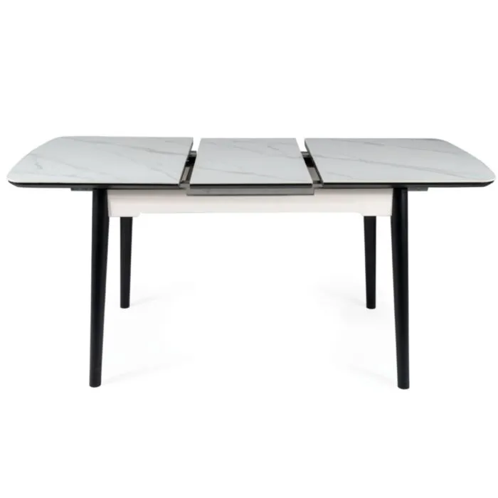 Raztegljiva jedilna miza LAROS Raztegljiva jedilna miza LAROS . Raztegljiva jedilna miza LAROS je modernega dizajna. Mizna plošča je narejena iz kvalitetne MDF plošče, ter keramike v