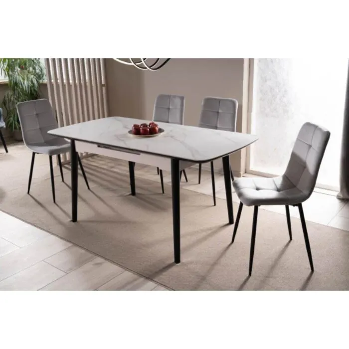 Raztegljiva jedilna miza LAROS Raztegljiva jedilna miza LAROS . Raztegljiva jedilna miza LAROS je modernega dizajna. Mizna plošča je narejena iz kvalitetne MDF plošče, ter keramike v