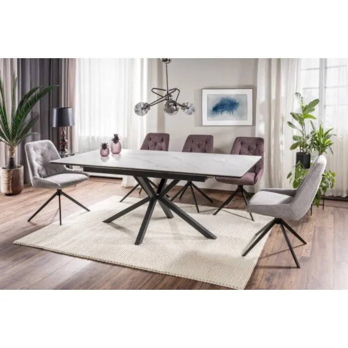 Raztegljiva jedilna miza LORBER - bela mat Raztegljiva jedilna miza LORBER - bela mat . Raztegljiva jedilna miza LORBER predstavlja praktičnost in sodobni pristop k ureditvi jedilnega prostora. Mizna