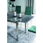 Raztegljiva jedilna miza MILA . Raztegljiva jedilna miza MILA v kombinaciji kaljenega stekla in kovine v krom barvi, bo prinesla svežino v vaš prostor. Miza