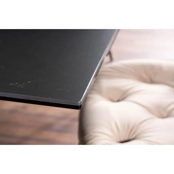 Raztegljiva jedilna miza SOMAL Raztegljiva jedilna miza SOMAL . Raztegljiva jedilna miza SOMAL modernega dizajna. Okvir je narejen iz kovine v črni mat barvi. Mizna plošča je narejena iz