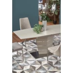 Raztegljiva jedilna miza SONTO . Raztegljiva miza SONTO je kakovostna miza iz kovine, stekla in MDF plošče. Sodobna in hkrati prefinjena oblika navdaja