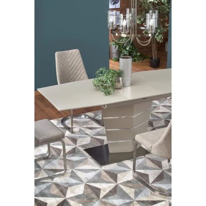 Raztegljiva jedilna miza SONTO Raztegljiva jedilna miza SONTO . Raztegljiva miza SONTO je kakovostna miza iz kovine, stekla in MDF plošče. Sodobna in hkrati prefinjena oblika navdaja