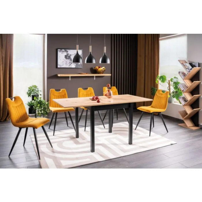 Raztegljiva jedilna miza SUE Raztegljiva jedilna miza SUE . Raztegljiva jedilna miza SUE je narejena iz kvalitetne laminirane plošče, v barvi hrasta. Nogice pa so črne barve. Miza je