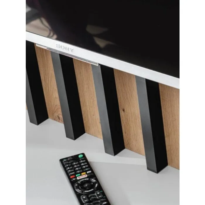 TV regal HOLI TV regal HOLI . TV regal HOLI je regal mimo katerega noben ljubitelj minimalističnega stila ne bo šel ravnodušno. Je kombinacija preproste in vizualno