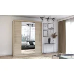 Drsna garderobna omara TARA je primerna za vsako spalnico. Omara ima udobne ročaje in ogledala na sprednjih straneh, ki optično povečajo prostor. V