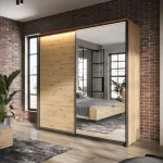 Garderobna omara KVIN 4 je modna omara z dvojnimi drsnimi vrati. Opremljena je z velikim ogledalom ter funkcionalno razporeditvijo polic in palic. V svoji