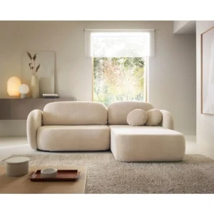 Kotna sedežna garnitura OLIONA je osupljiv kos pohištva z brezčasnim slogom, ki se bo podal k vsakemu dekorju. Njene zaokljene, mehke oblike in