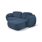 Kotna sedežna garnitura OLIONA je osupljiv kos pohištva z brezčasnim slogom, ki se bo podal k vsakemu dekorju. Njene zaokljene, mehke oblike in