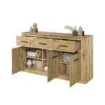 Odkrijte ravnovesje med funkcionalnostjo in estetiko z našo impresivno komodo JANITA 2. Ta elegantna komoda ne ponuja le praktičnega prostora za