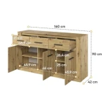 Odkrijte ravnovesje med funkcionalnostjo in estetiko z našo impresivno komodo JANITA 2. Ta elegantna komoda ne ponuja le praktičnega prostora za