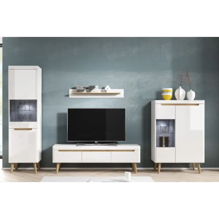 Dnevni regal RON Elegantna dnevna soba s stilom skandinavskega sloga. Dobavljiva je v bela mat/bela visoki sijaj. Hrastove lesene noge, ABS robovi, vrata(ličnice) so MDF.